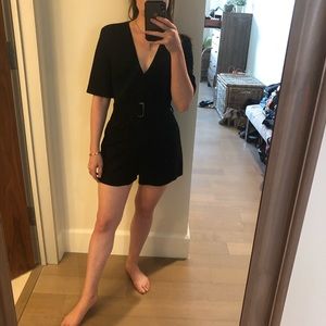 Black faux suede belted romper from Zara